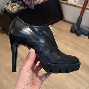 Elegant Black Leather Heeled Boots